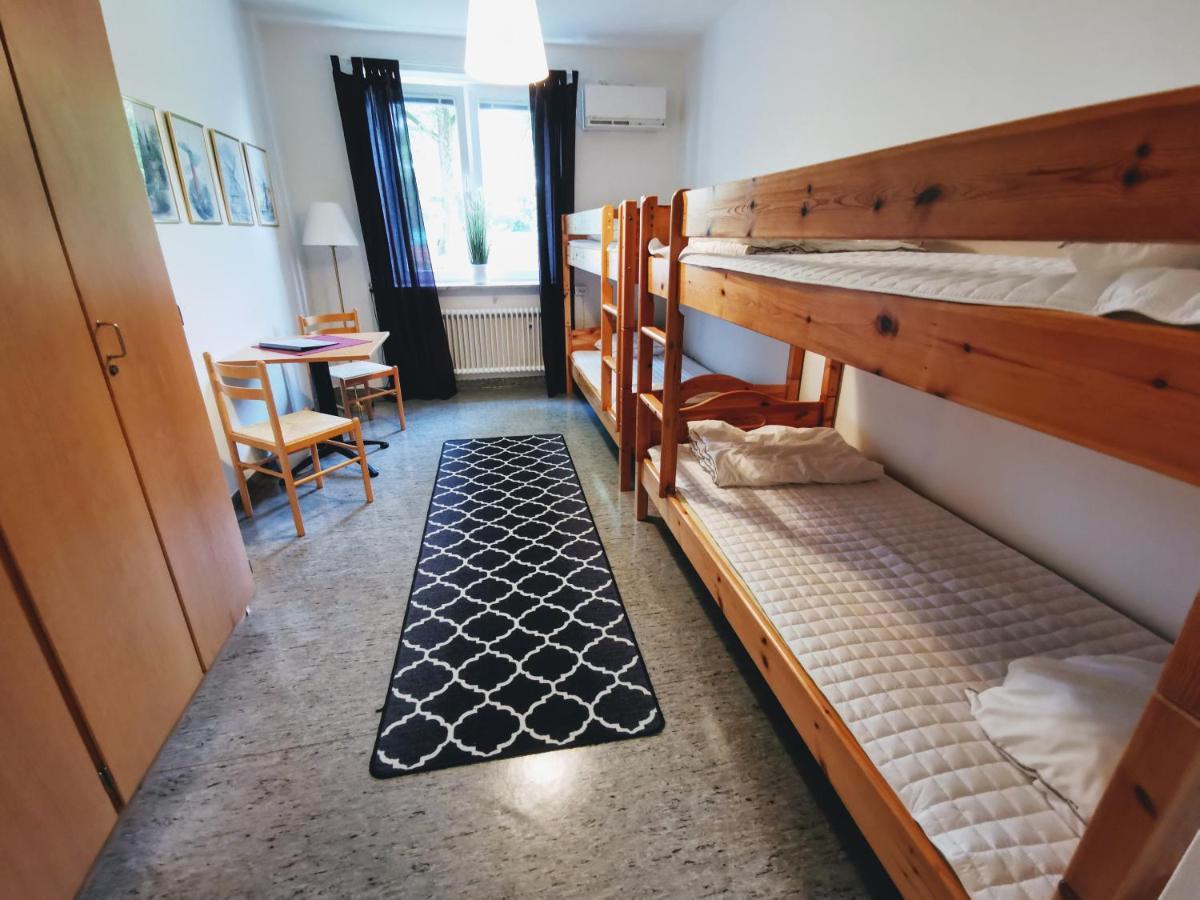 Fyrbäddsrum med delat badrum