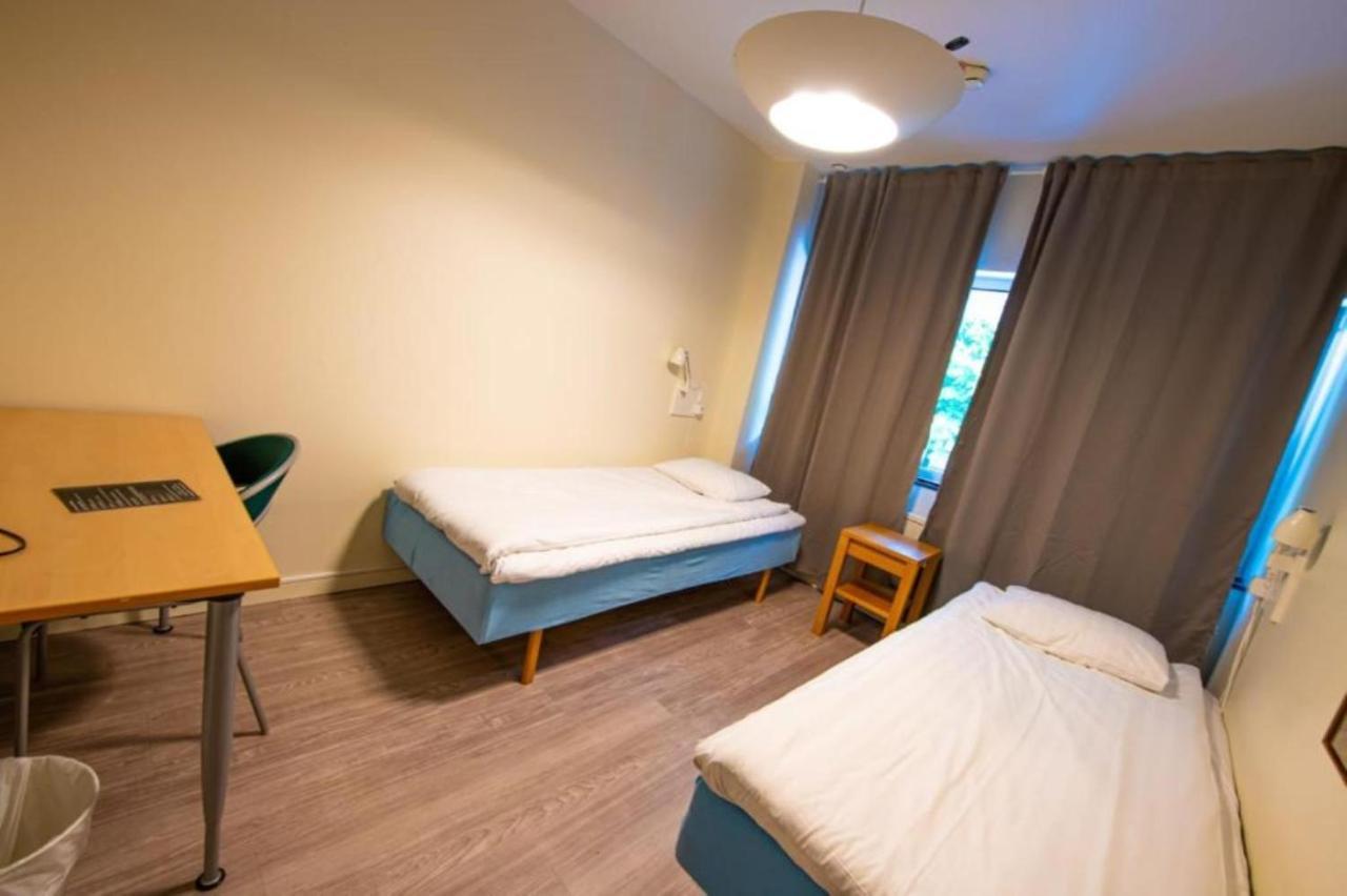 Fyrbäddsrum med delat badrum