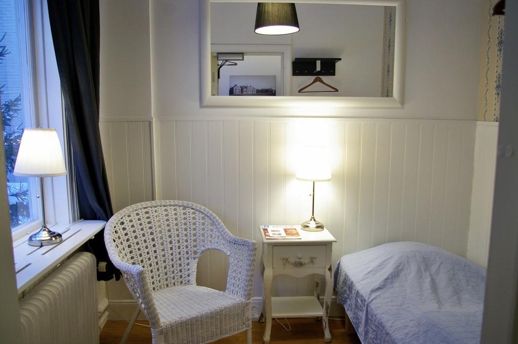 Enkelrum med delat badrum