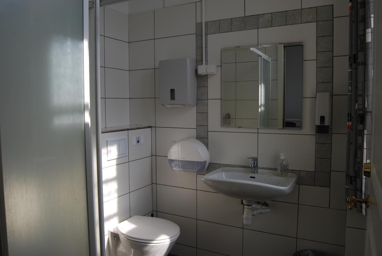 Fyrbäddsrum med eget badrum